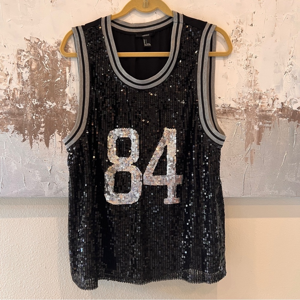 Forever 21 sequined lined top. Size L  40 year reunion shirt Black & silver.